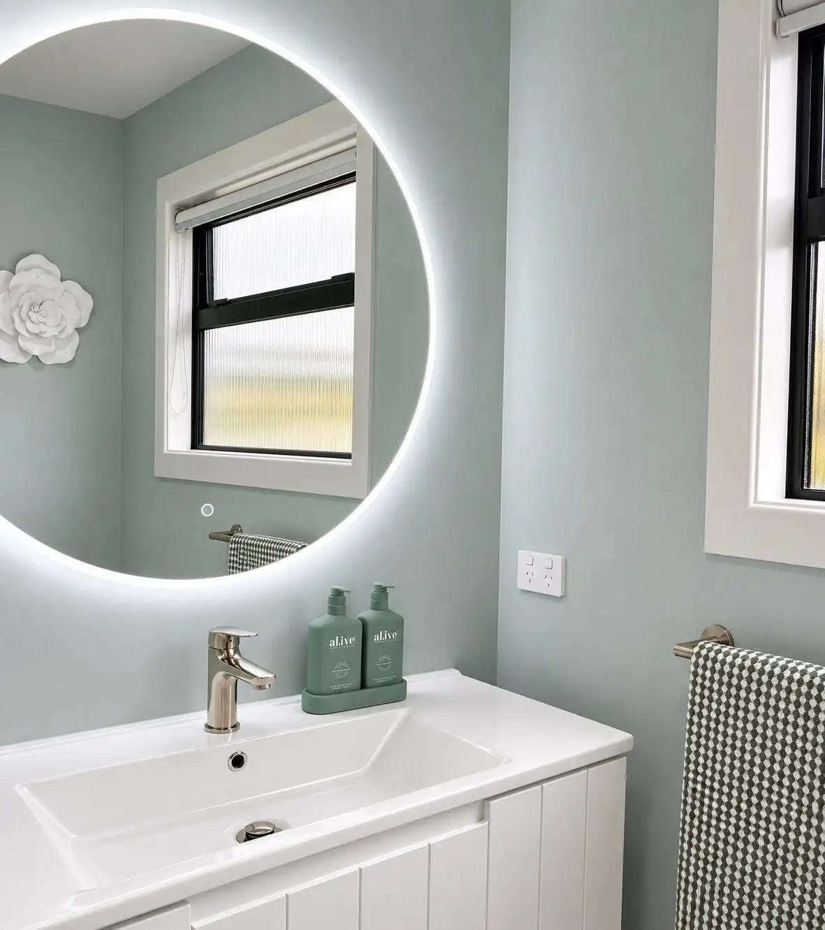 Bathroom walls painted pale blue